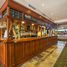 Enjoy a drink at the Kirribilli Hotel bar.