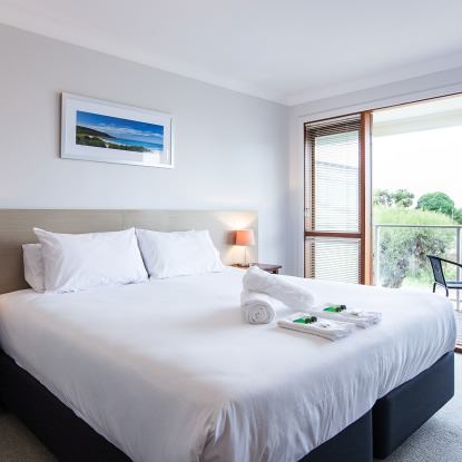 Royal Palms Resort accommodation featuring Queen bedroom with balcony