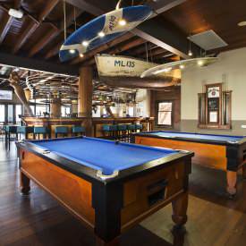 Relax over a game of pool at Seacliff Beach Hotel
